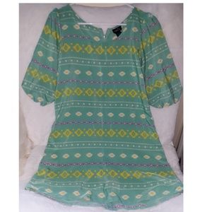 blue dress with yellow and pink details